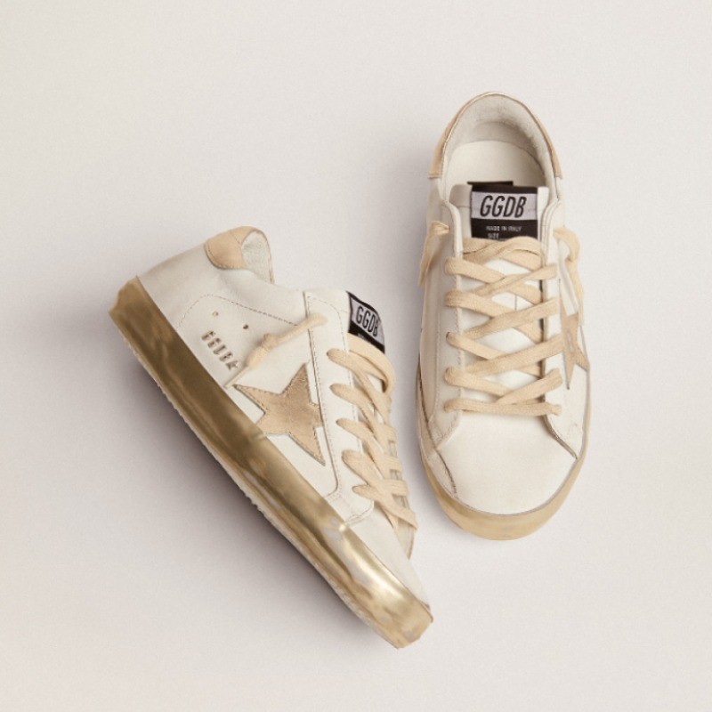 Women's Super-Star with gold sparkle foxing and metal stud lettering sneakers Size 10